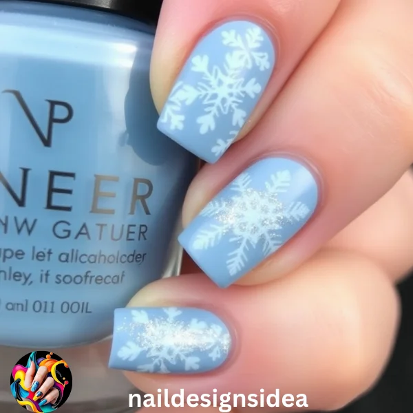 Nothing says winter like snowflakes! Snowflake nail art features delicate, intricate patterns that give your nails a frosty charm