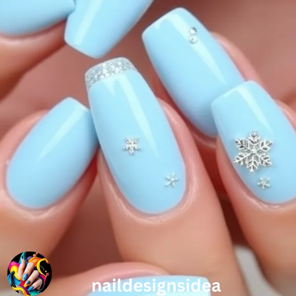 One trending choice this year is baby blue Christmas nails. This soft, frosty hue brings a touch of elegance and captures the magic of winter. 