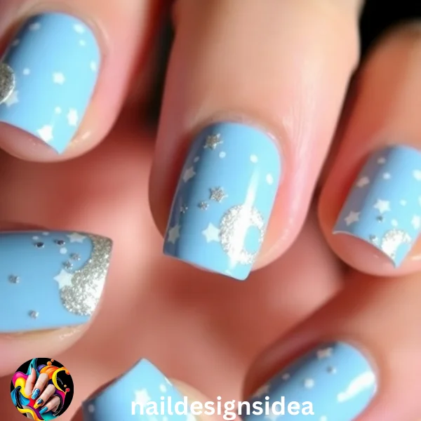 Transform your nails into a winter night sky with starry patterns. Use a baby blue base as your canvas, and add tiny white stars, dots, and even crescent moons to create a celestial effect. 