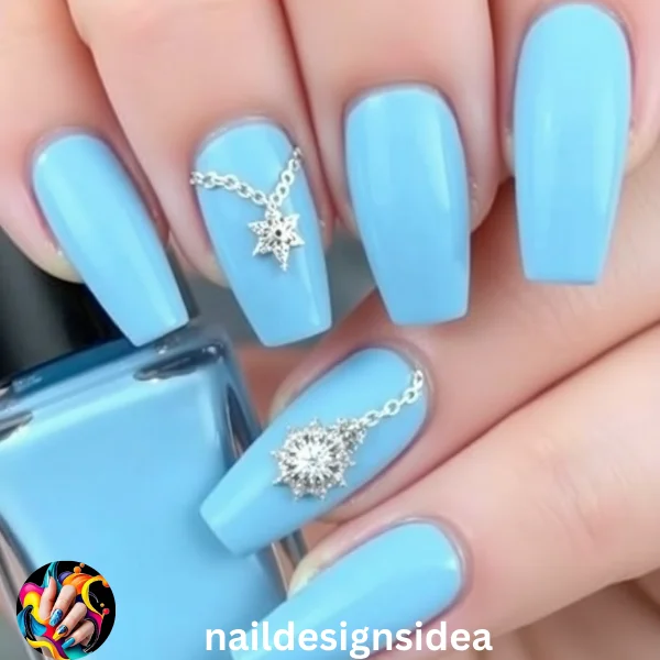 Baby blue nails bring a fresh and unique perspective to Christmas manicures. 