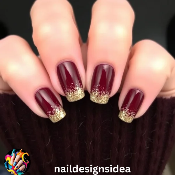 Dark burgundy nails with a glitter gradient offer a sophisticated yet festive option for the holiday season. 