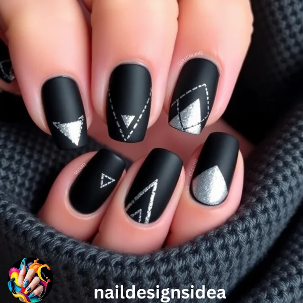 Matte Black and Silver Geometric Patterns for Dark Christmas Nail Designs