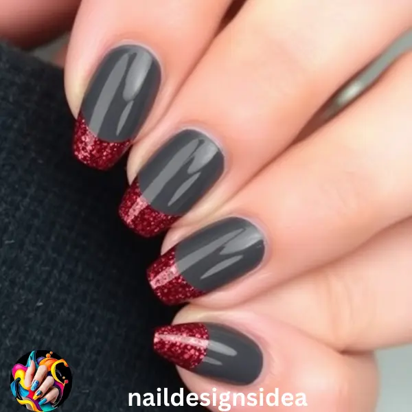 Charcoal gray nails bring a modern, edgy twist to Christmas nail designs.