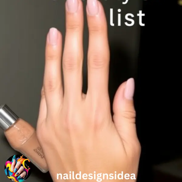 Minimalist nail designs, including Pamela Anderson’s “naked” nails, celebrate the beauty of simplicity. 