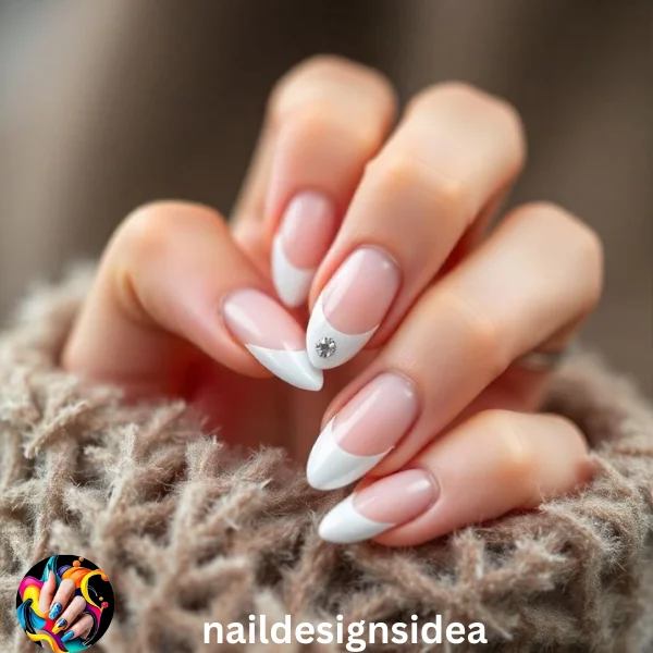 Frosted nails are a stunning way to capture the essence of winter. Use a frosty white or icy blue polish for your tips, blending it into a sheer nude base.