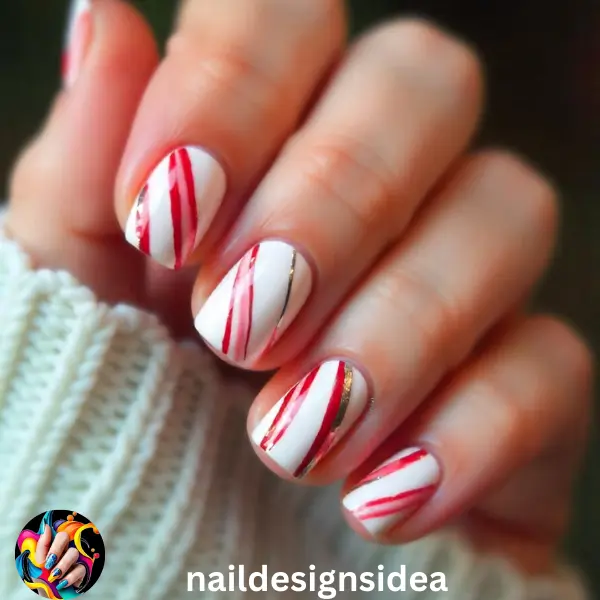 Candy cane nails are a festive favorite that can be made dainty with thin, precise stripes. 