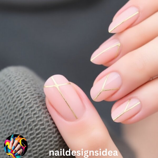 Add thin gold lines to your nails for a sleek and simple design. These lines can follow the natural shape of the nail or create geometric patterns. 