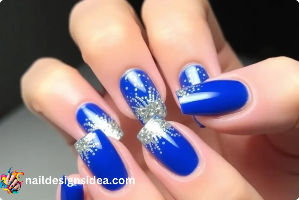 Sapphire Blue New Year Nails with Silver Foil Art