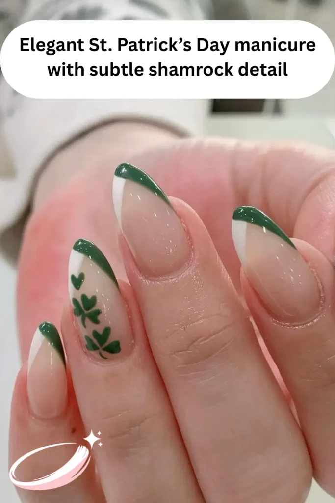Elegant St. Patrick’s Day manicure with subtle shamrock detail