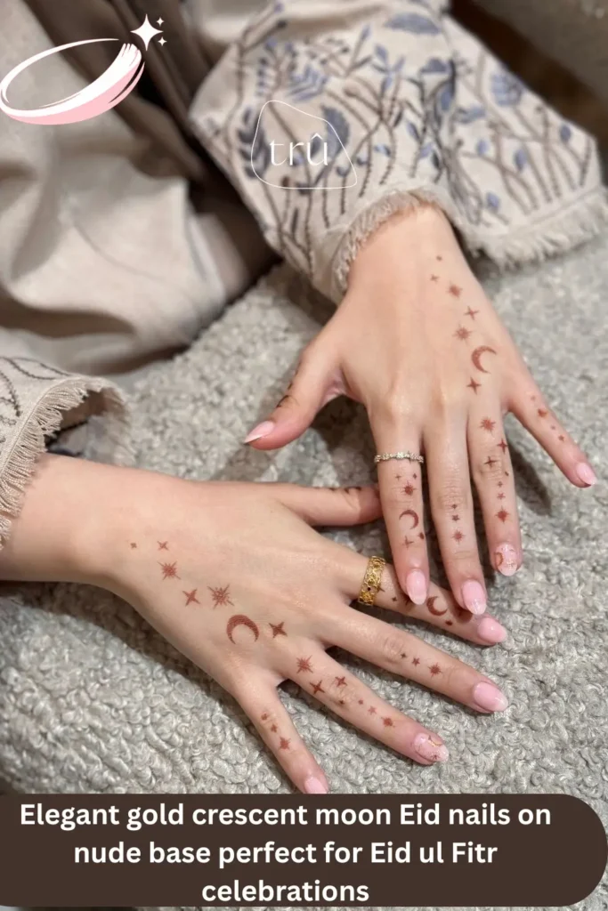 Elegant gold crescent moon Eid nails on nude base perfect for Eid ul Fitr celebrations