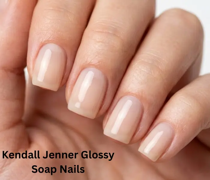 Kendall Jenner inspired glossy soap nails with luminous translucent nude polish for a clean, minimalist, and elegant manicure.