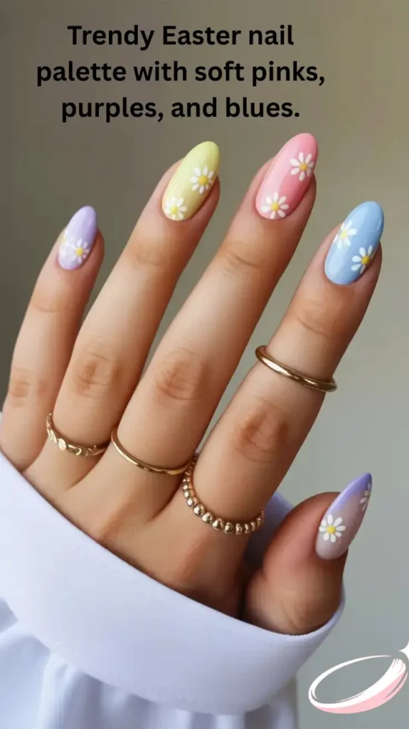 Trendy Easter nail palette with soft pinks, purples, and blues.

